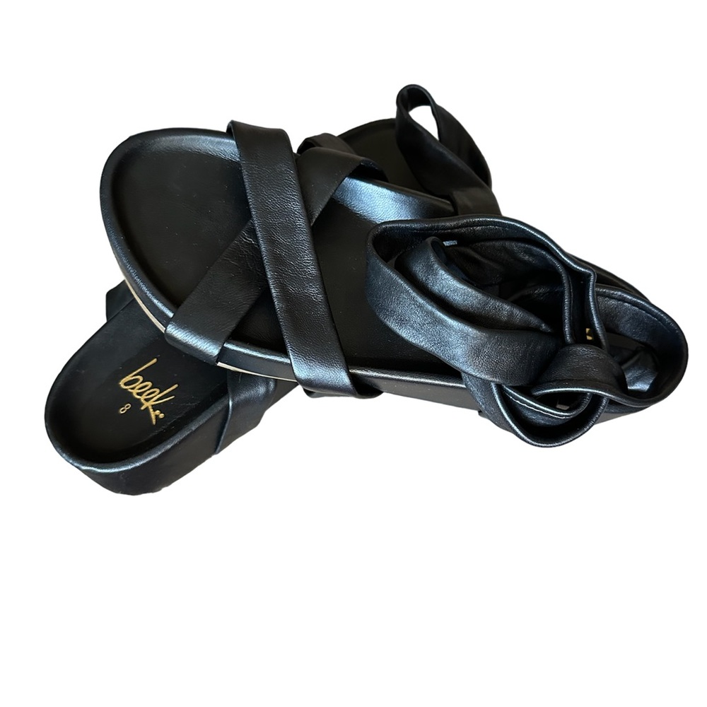 Leather new beek sandals in box with protection bag.